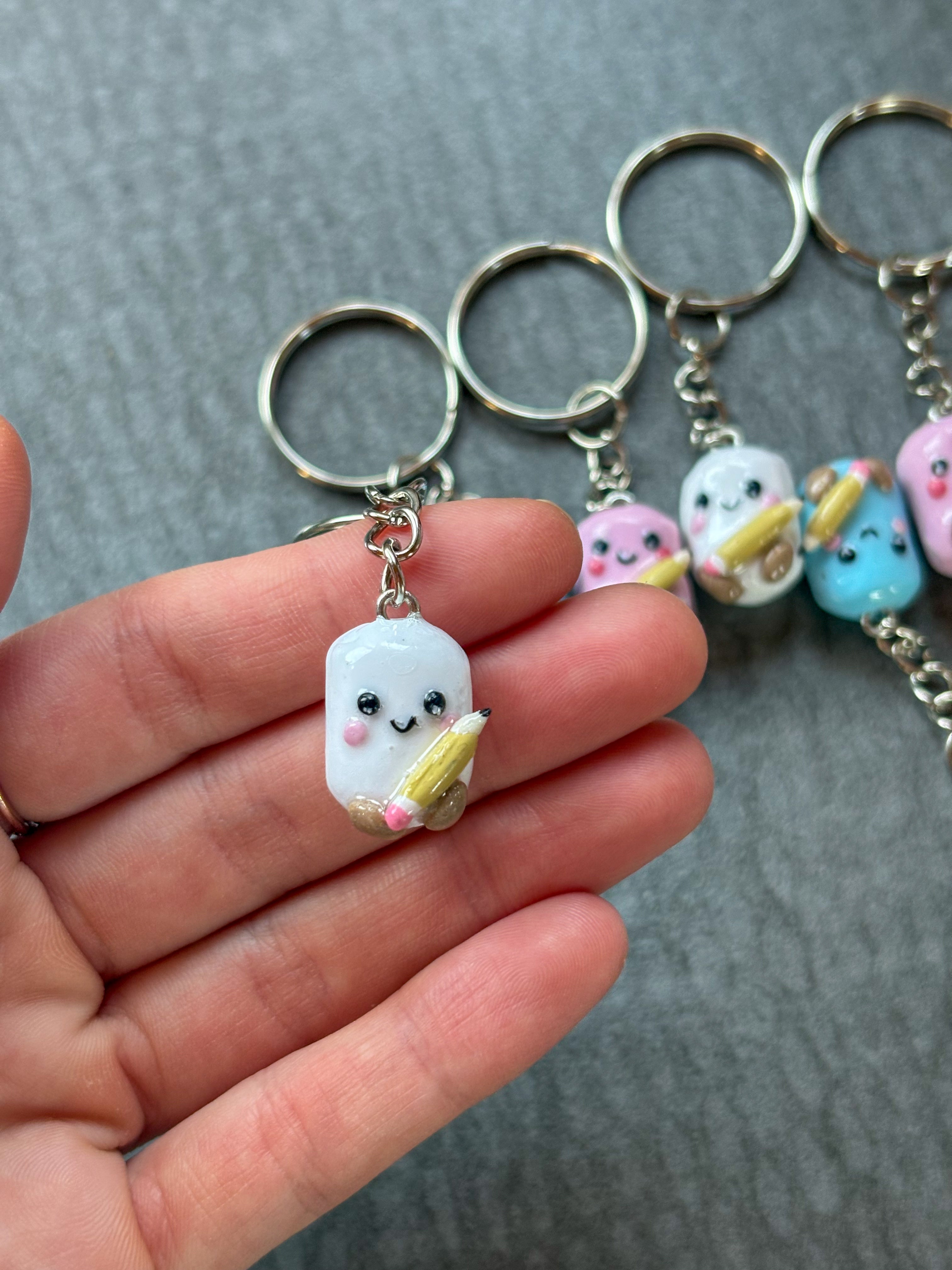 White marshmallow holding pencil Jellycat inspired keyring