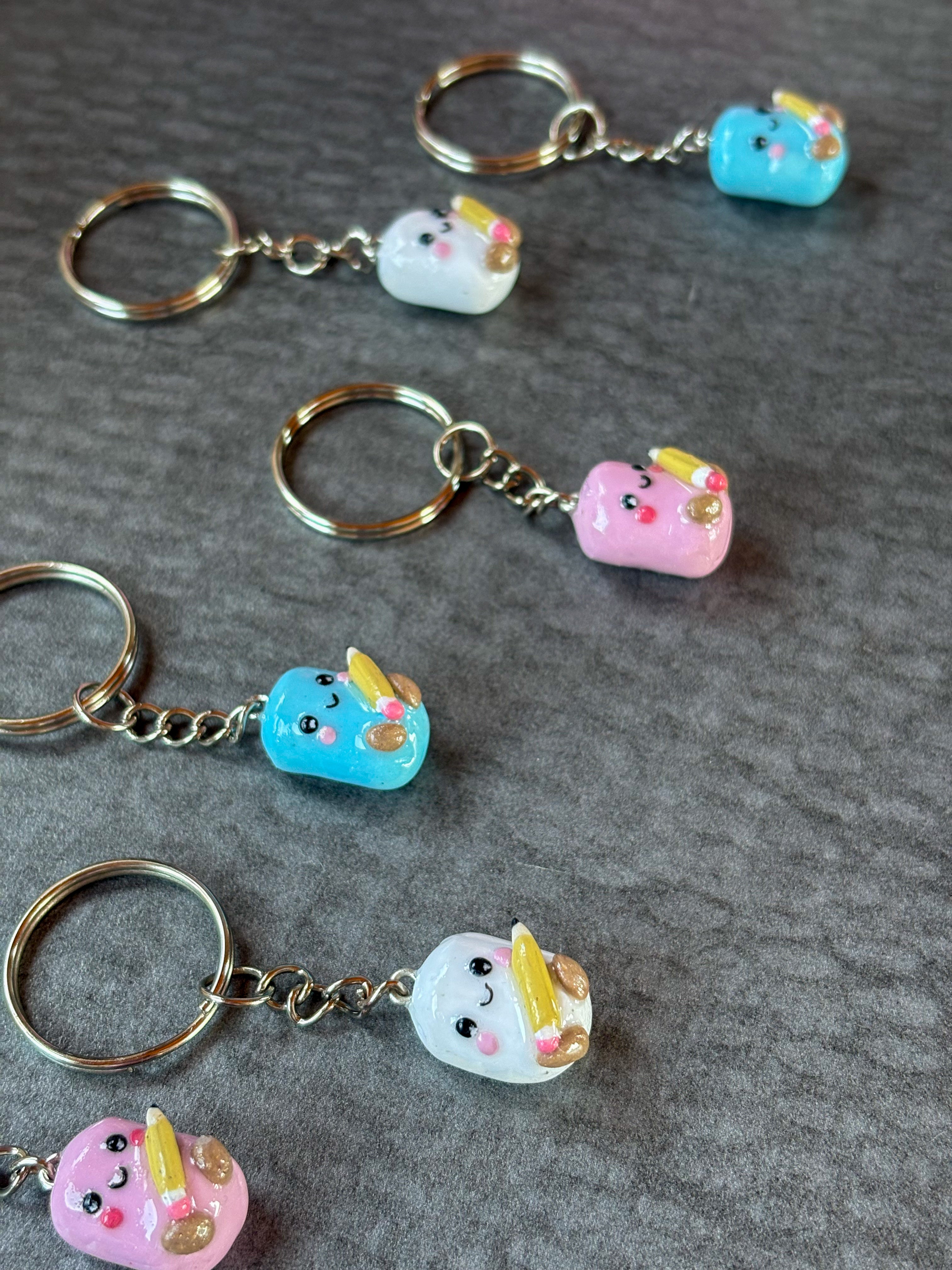 Blue marshmallow holding pencil Jellycat inspired keyring