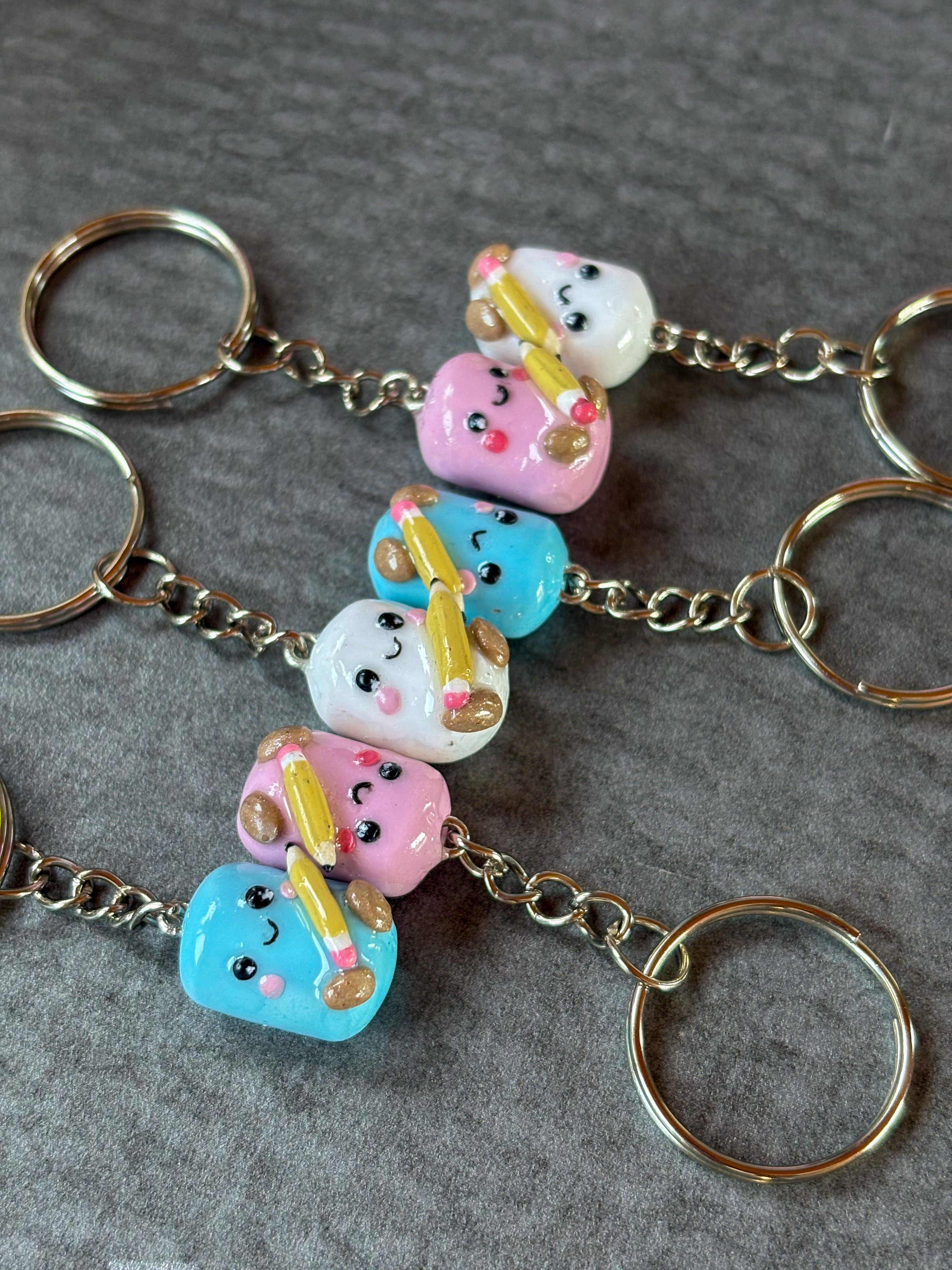 Blue marshmallow holding pencil Jellycat inspired keyring